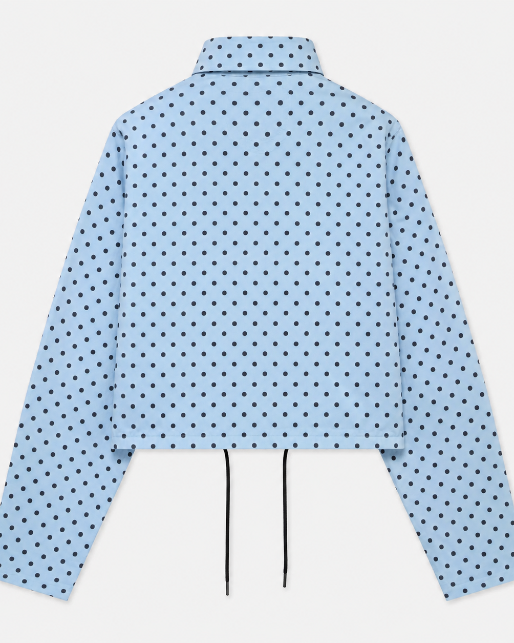 Textured dotted jacquard bomber jacket showing ribbed hem and zip fastening detail