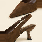 Close-up of the chocolate faux suede surface and elasticated heel strap seam