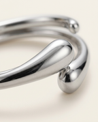Close-up of the polished silver cuff bracelet
