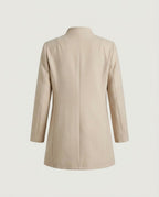 Cream collarless coat from the back showing the straight cut