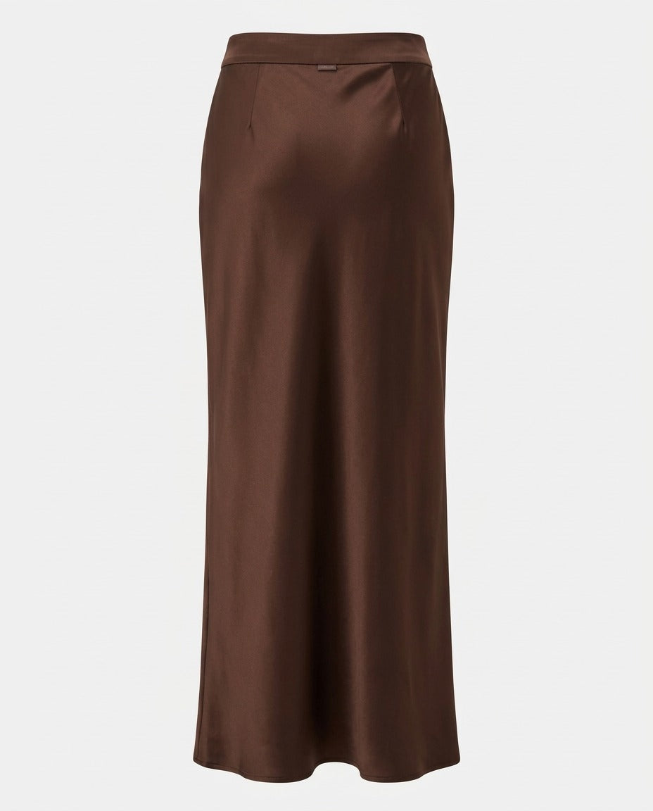 Back view of the Column Slip Skirt in Chocolate showing the clean line of the silhouette.