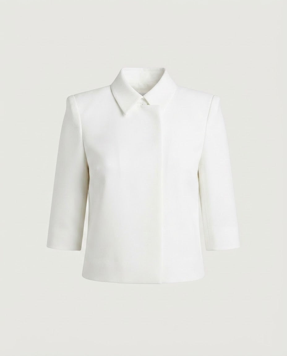 Ivory cropped jacket with point collar and concealed front, front view