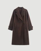 Full length view of the Chocolate double-breasted coat with wide lapels.