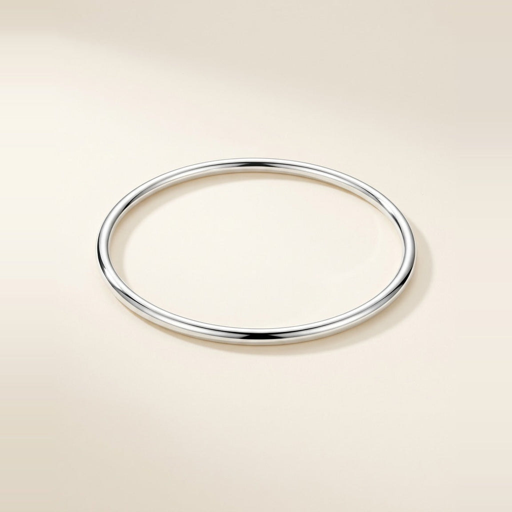 Essential Bangle bracelet in Silver, high polish finish.