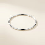 Essential Bangle bracelet in Silver, high polish finish.