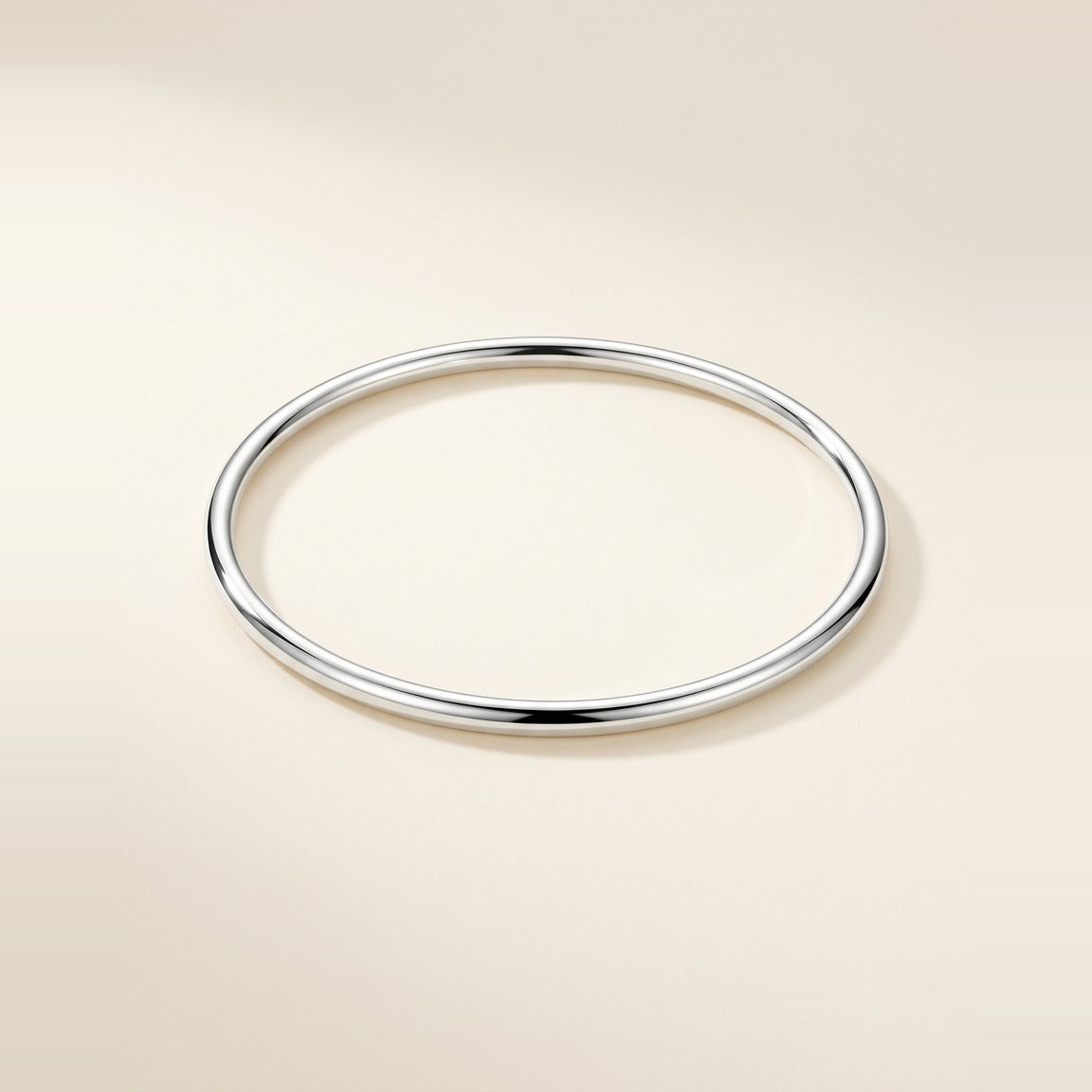 Essential Bangle bracelet in Silver, high polish finish.