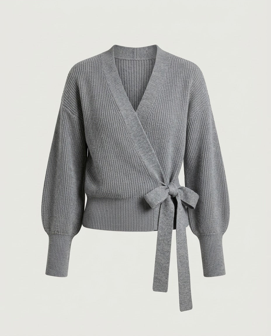 Grey knit wrap top with side tie closure, front view.