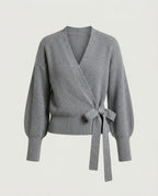 Grey knit wrap top with side tie closure, front view.