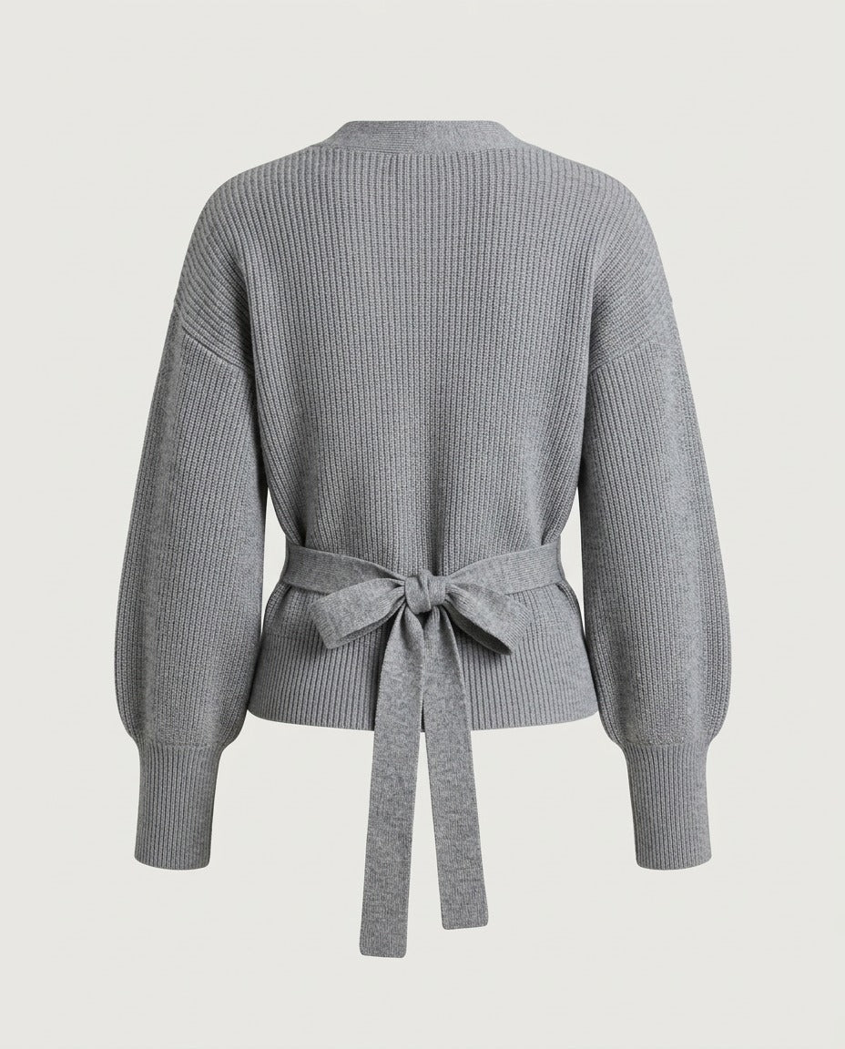 Grey knit top, back view showing the close-cut silhouette.