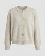 Fine gauge button cardigan in oatmeal, front view.