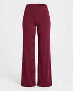 Burgundy jersey trouser with high waist and wide flared leg.