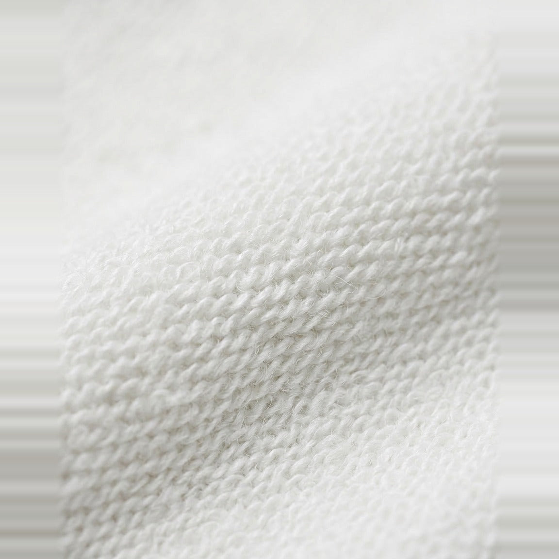 Faux Fur Hood Bomber in White, soft looped jersey texture close-up