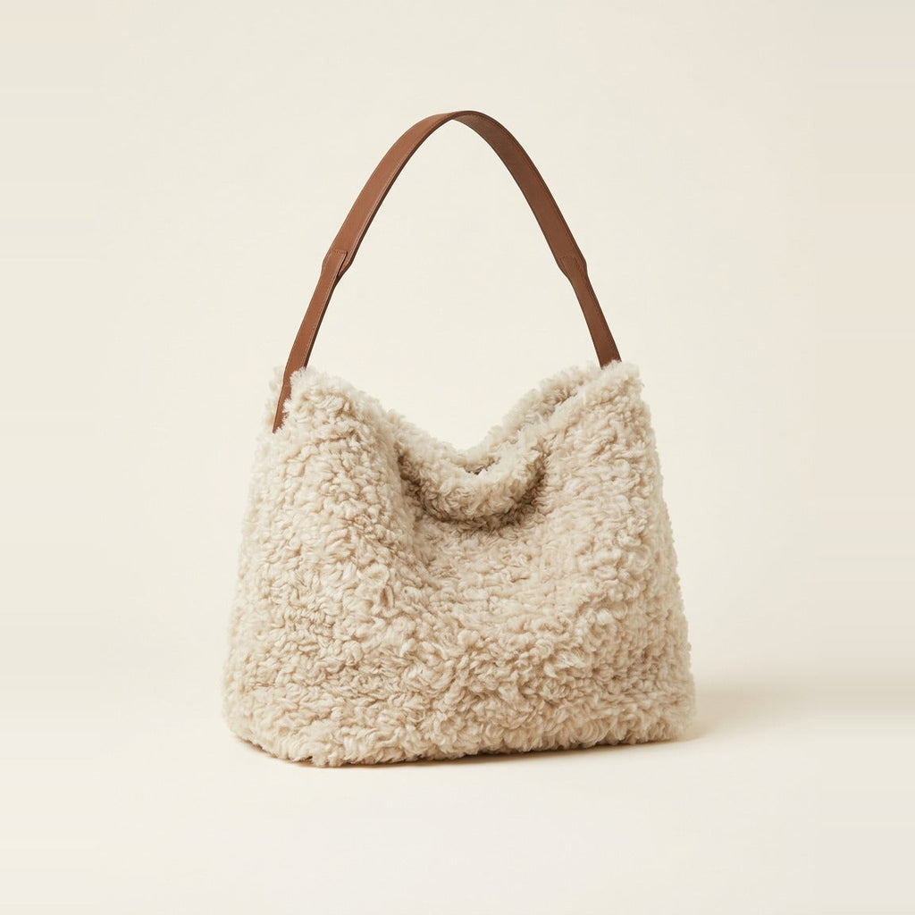 Gathered deep pile shoulder bag in Oatmeal with brown strap.