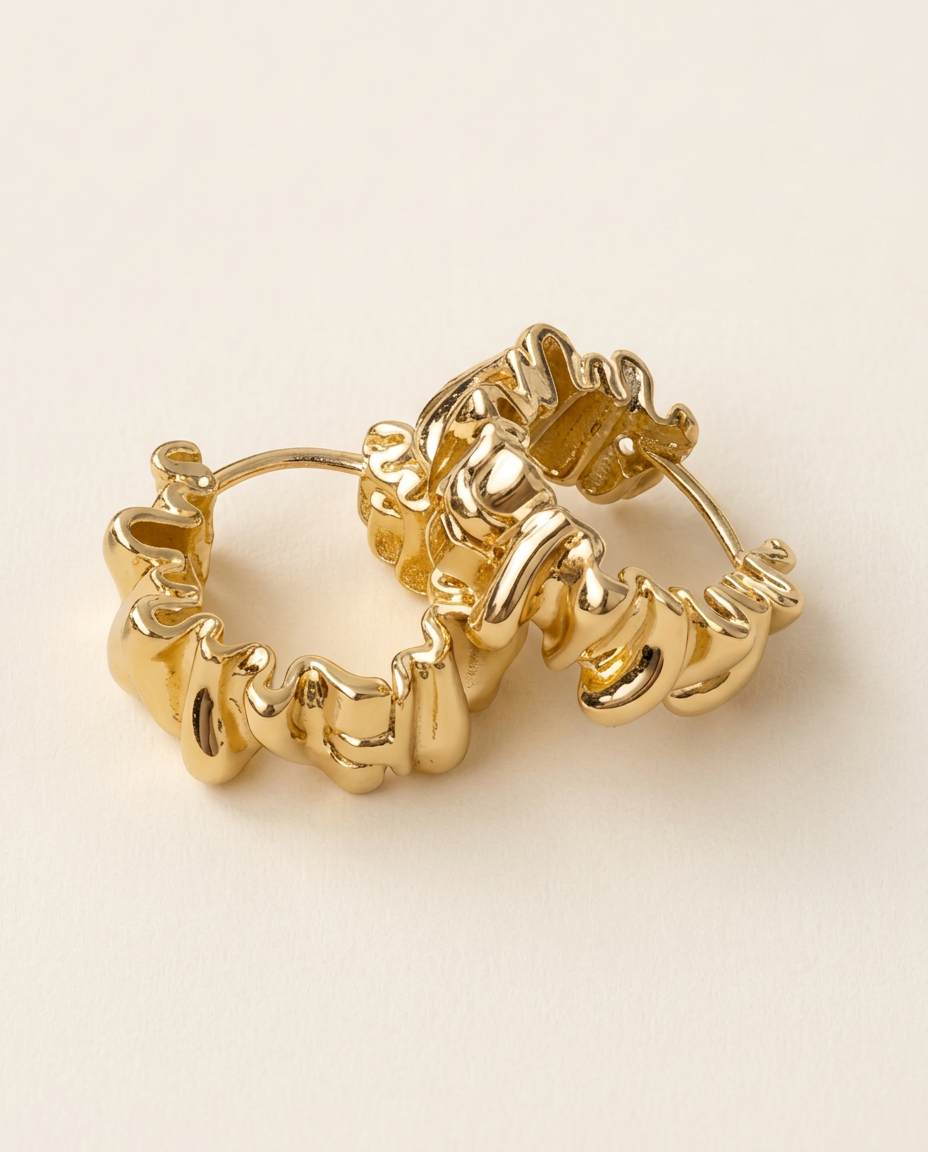 Pair of Sculptural Wavy Hoop Earrings in Gold, product view
