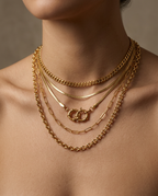 Macro view of the round Gold spring buckle closure on the Gold chain