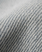Barrel Leg Jeans in Light Wash, pale blue twill denim close-up