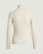 Back view of the ribbed turtleneck sweater in cream.