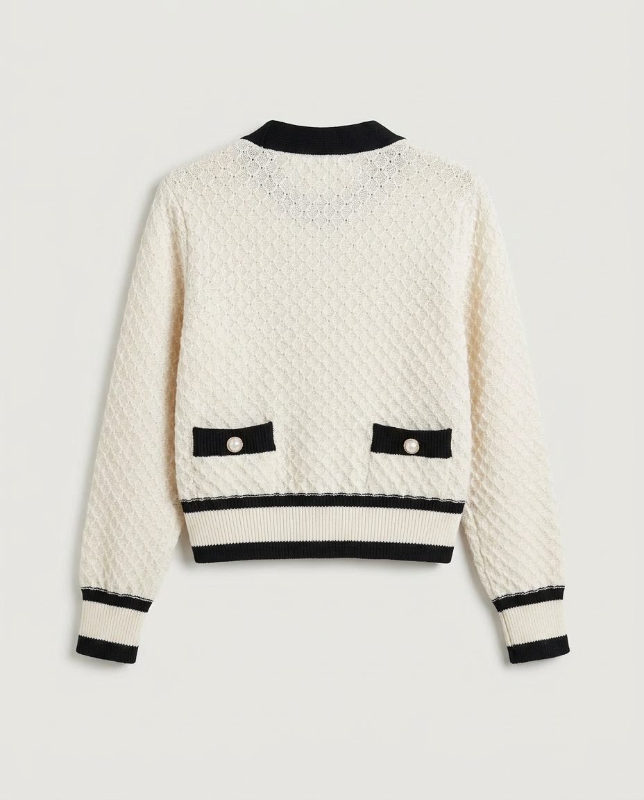 Rear view of the textured knit cardigan in cream and black