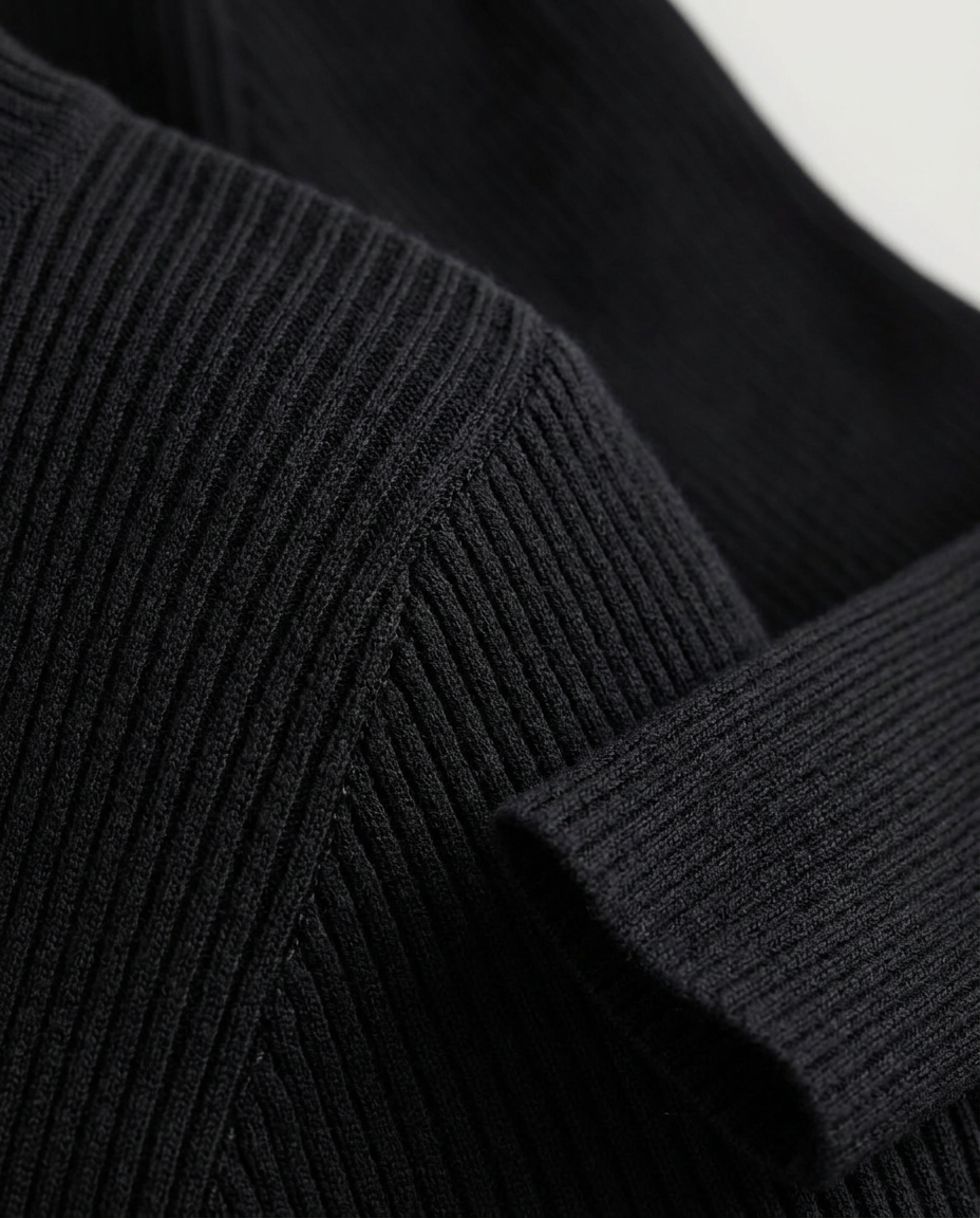Essential Ribbed Mock Neck Sweater in Black, ribbed shoulder seam and cuff, detail view