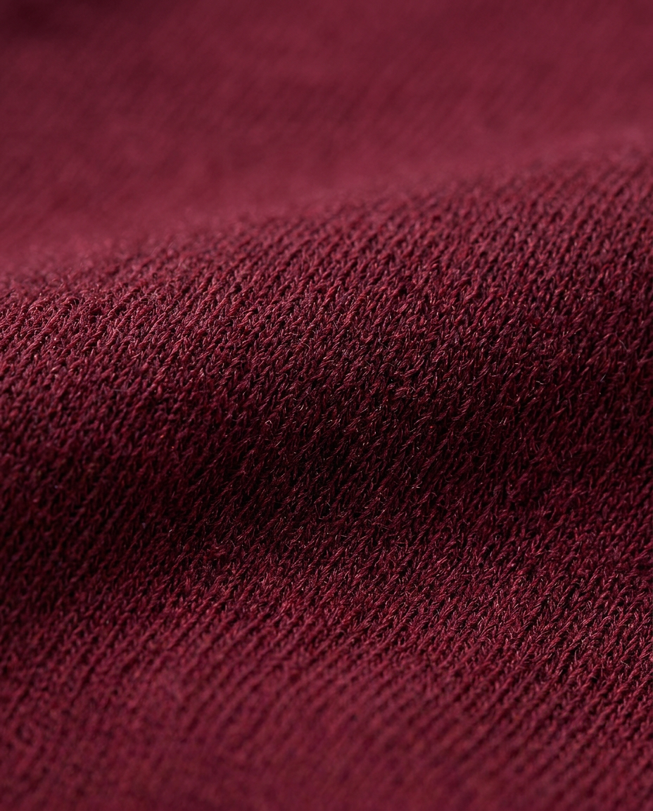 Flared Jersey Trousers in Burgundy, soft jersey knit surface close-up