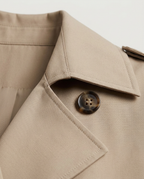 Oversized Trench Coat in Taupe, point collar, storm flap and button, detail view
