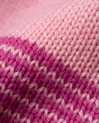 Striped Ruffle Cardigan in Purple, pink and magenta striped knit close-up