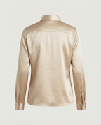 Back view of cream satin blouse showing straight yoke and clean hemline
