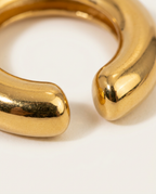 Close-up of the rounded metal surface in Gold