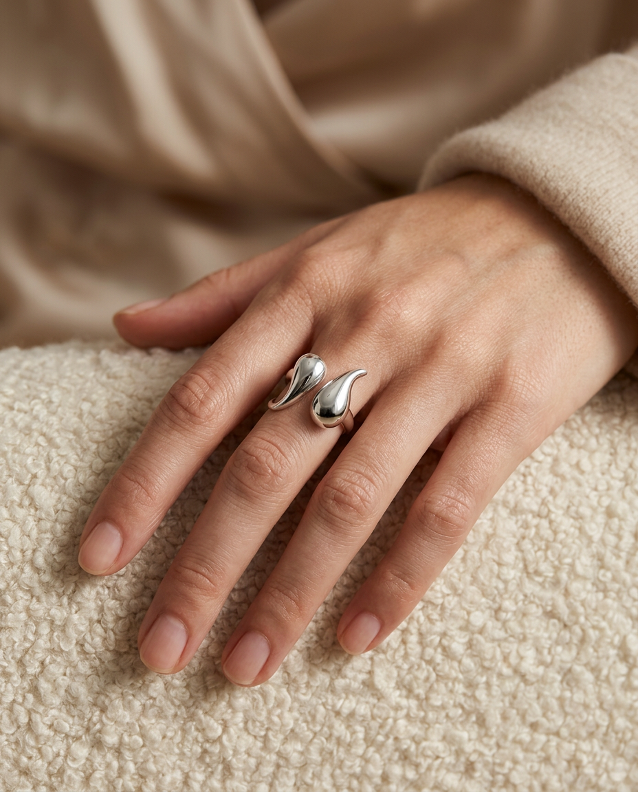 Worn detail shot of the high-polish ring in Silver
