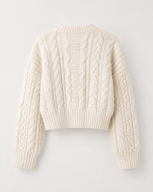 Ribbed knit cardigan showing soft rib texture and button detail, close view