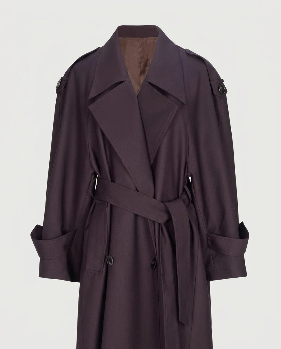 Front view of the oversized belted trench coat in burgundy.