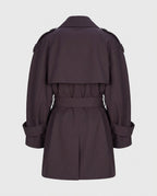 Back view of the oversized belted trench coat in burgundy.