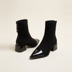 Patent Cap Toe Stretch Bootie in Black, showing the sharp silhouette.