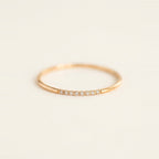 Pave Stacking Ring in Gold, shown on a ring stand.