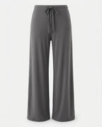 Grey jersey trouser, back view, showing relaxed fit through the leg.