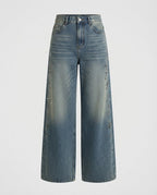 Mid wash wide-leg jeans with crystal trail down the side seam, front view