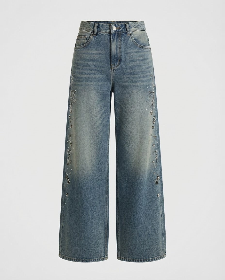 Mid wash wide-leg jeans with crystal trail down the side seam, front view