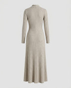 Ribbed Knit Flared Midi Dress in Oatmeal, showing the flared line of the skirt.