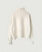 Cream ribbed turtleneck knit with balloon sleeves, front view