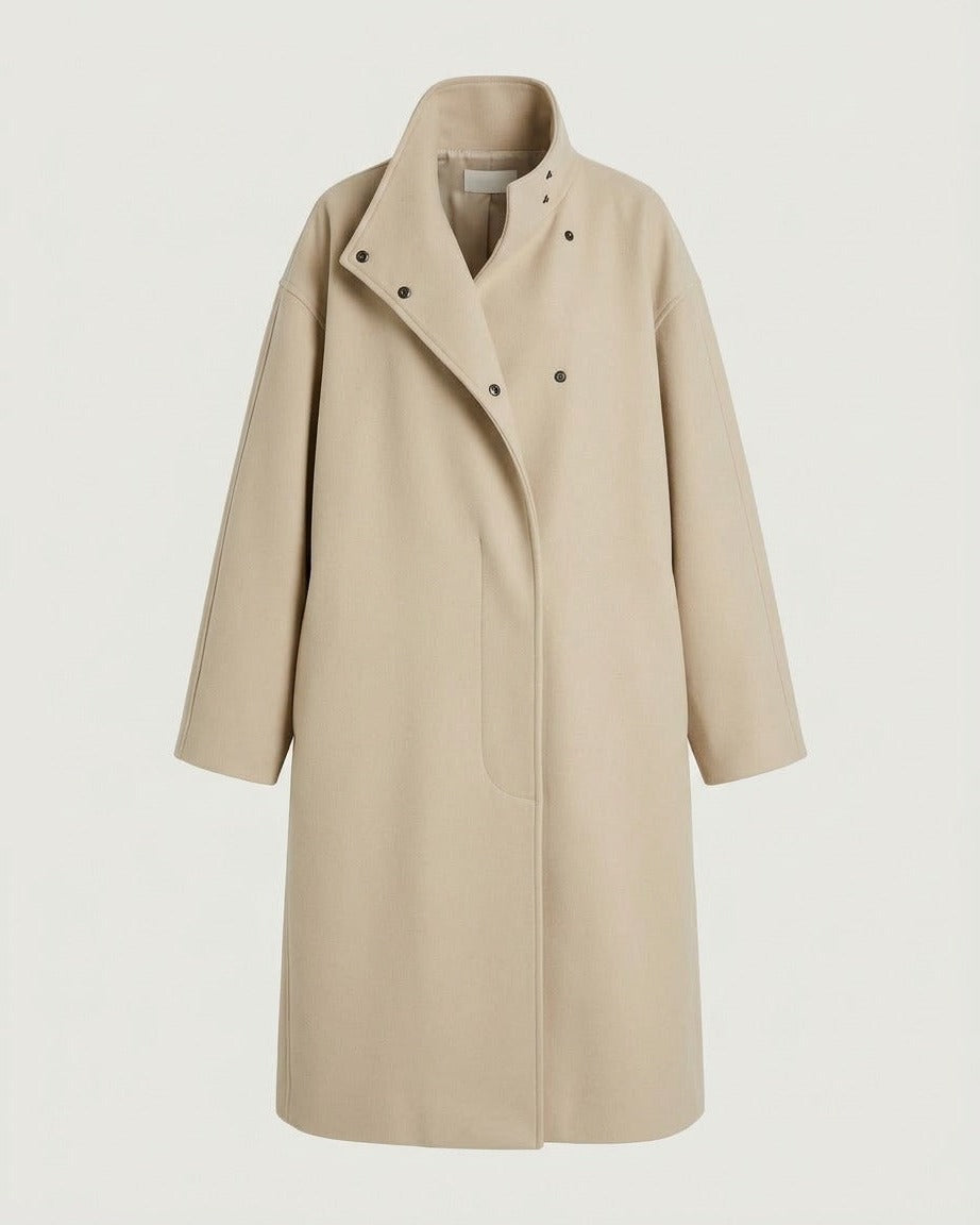 Front view of the stand-collar cocoon coat in oatmeal.