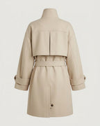 Three-quarter view of the stand-collar cocoon coat in oatmeal.