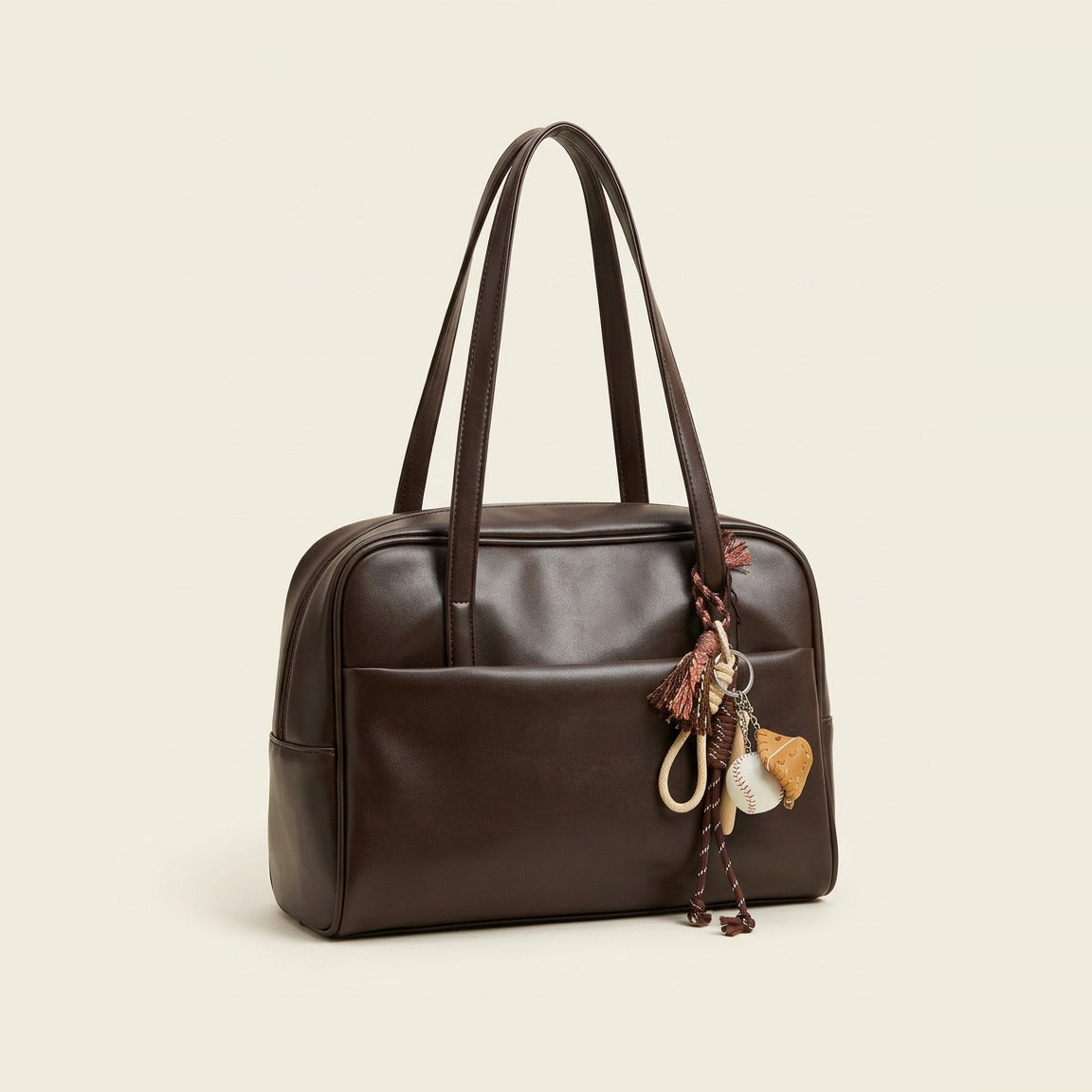 Structured Daily Tote held on the shoulder in Chocolate