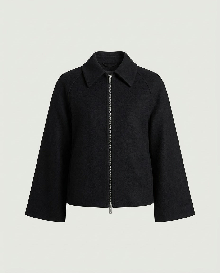 Model wearing the Structured Wide Sleeve Zip Jacket in Black, shown zipped up.