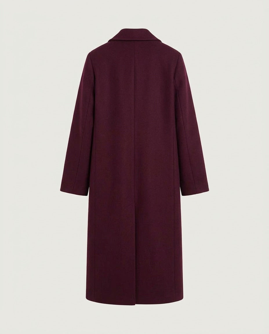 Tailored double-breasted long coat in burgundy, back view.