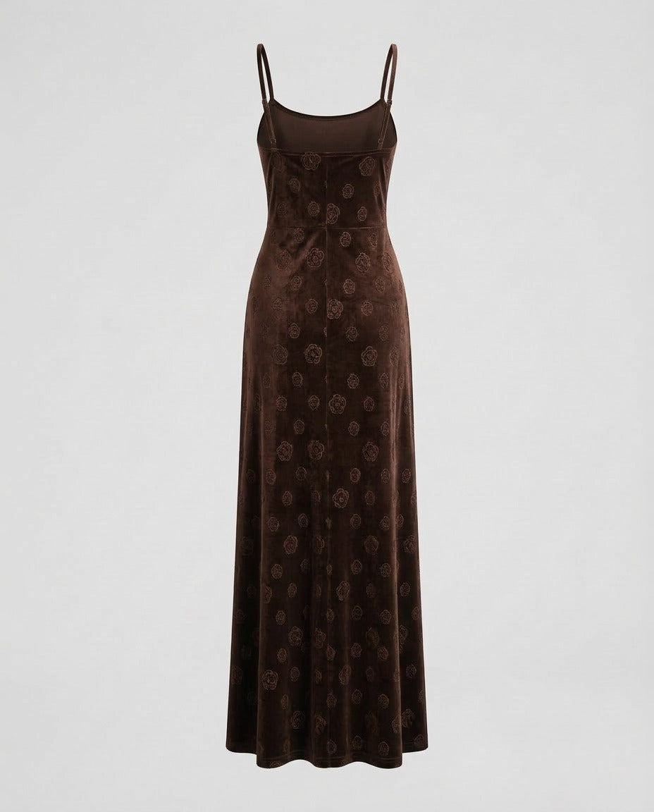 Black velvet slip dress back view showing the straight cut and hem.