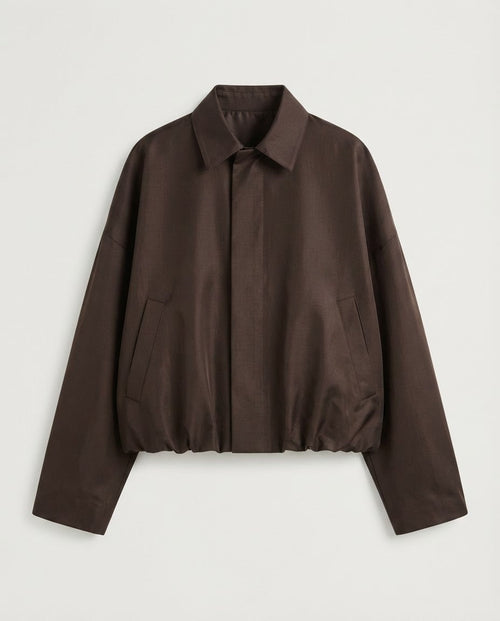 Espresso bomber from the back showing yoke seam and elasticated blouson hem